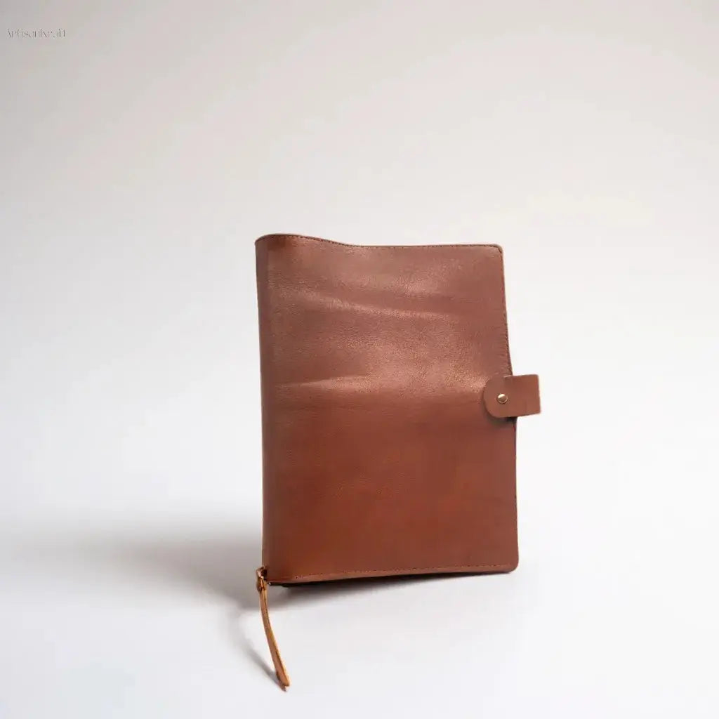 Minimalist handcrafted leather journal cover in Tuscany Brown, perfect for creative writing or professional notes